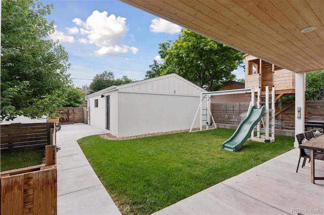 3478 Chase St, Wheat Ridge, CO 80212 - fenced backyard with a playground and a patio