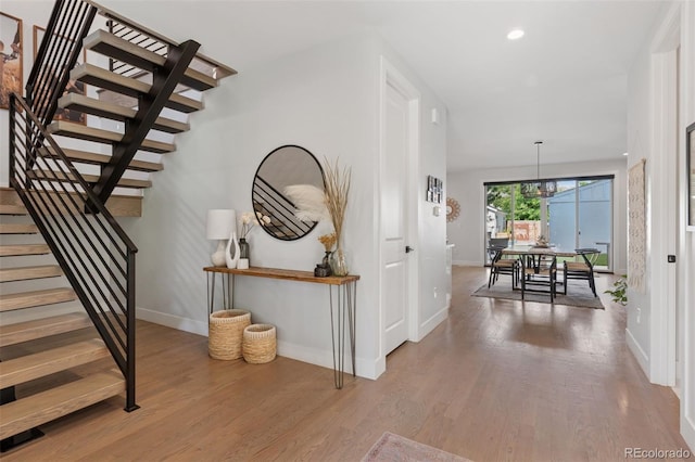 3478 Chase St, Wheat Ridge, CO 80212 - entrance foyer featuring stairway, wood finished floors, and recessed lighting