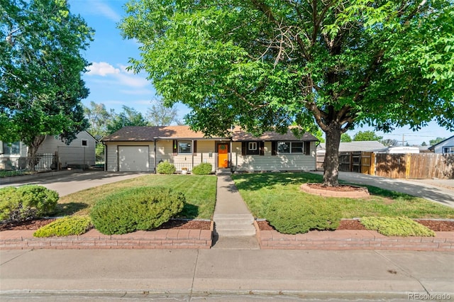 7310 Granada Rd, Denver, CO 80221 - ranch-style house with a garage and concrete driveway
