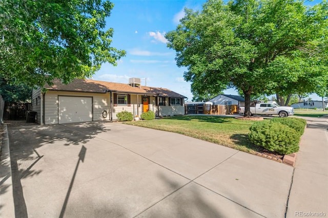 7310 Granada Rd, Denver, CO 80221 - ranch-style home with an attached garage and driveway