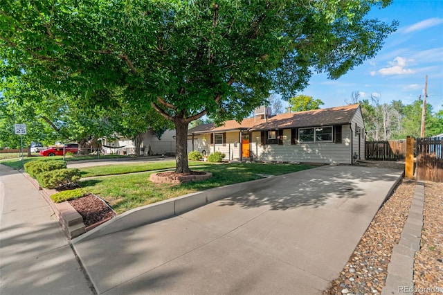 7310 Granada Rd, Denver, CO 80221 - view of front of home featuring driveway