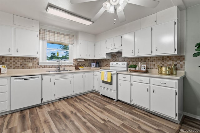 7310 Granada Rd, Denver, CO 80221 - kitchen with white appliances, under cabinet range hood, ceiling fan, and light countertops