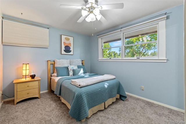 7310 Granada Rd, Denver, CO 80221 - bedroom with light colored carpet and a ceiling fan