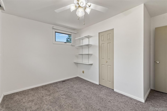 7310 Granada Rd, Denver, CO 80221 - unfurnished bedroom with carpet floors, ceiling fan, and a closet