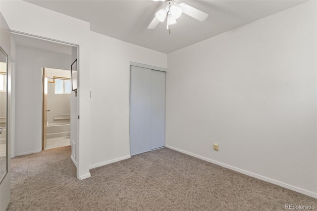 7310 Granada Rd, Denver, CO 80221 - unfurnished bedroom with carpet flooring, a closet, and a ceiling fan