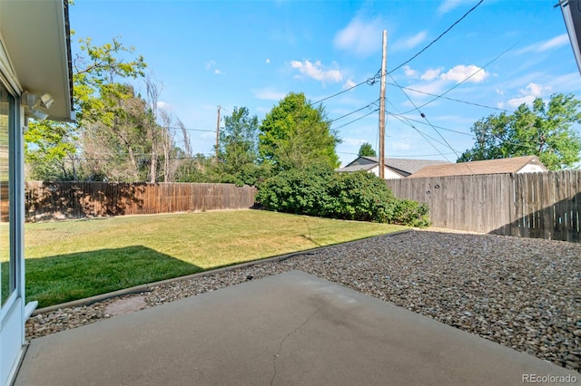7310 Granada Rd, Denver, CO 80221 - fenced backyard with a patio area