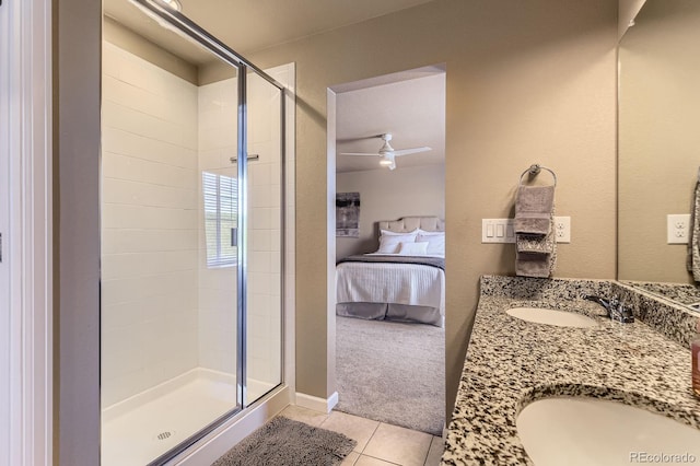 12851 Billingsley Trl, Parker, CO 80134 - ensuite bathroom with tile patterned flooring, a shower stall, double vanity, and ceiling fan