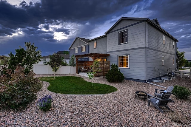 12851 Billingsley Trl, Parker, CO 80134 - rear view of house with an outdoor fire pit