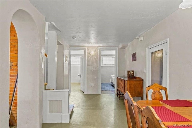 310 E 2nd St, Trinidad, CO 81082 - dining area featuring finished concrete floors and arched walkways