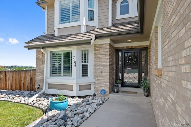 7056 S Owens St, Littleton, CO 80127 - property entrance with brick siding
