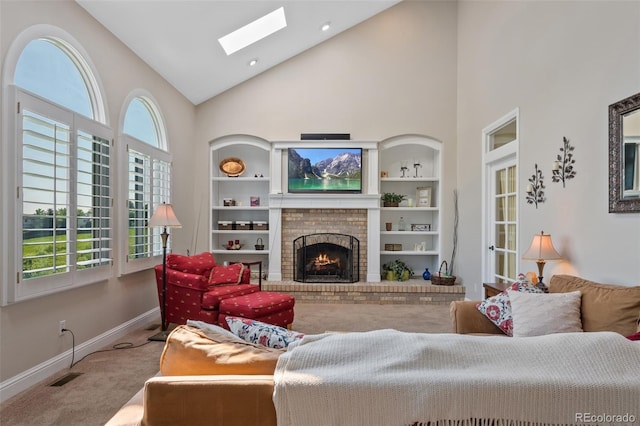 7056 S Owens St, Littleton, CO 80127 - living room with carpet floors, high vaulted ceiling, baseboards, a skylight, and a brick fireplace