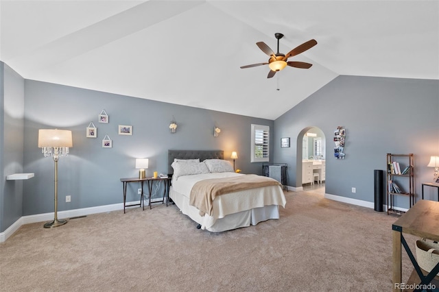 7056 S Owens St, Littleton, CO 80127 - bedroom with lofted ceiling, carpet flooring, arched walkways, baseboards, and a ceiling fan