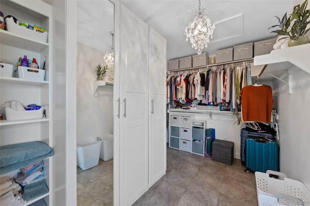 7056 S Owens St, Littleton, CO 80127 - walk in closet with a chandelier