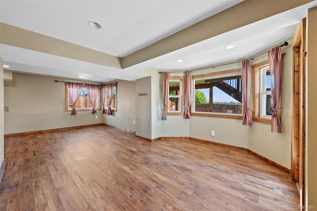 7056 S Owens St, Littleton, CO 80127 - empty room featuring wood finished floors, baseboards, and recessed lighting