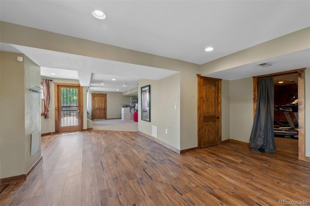 7056 S Owens St, Littleton, CO 80127 - unfurnished living room with wood finished floors, baseboards, and recessed lighting