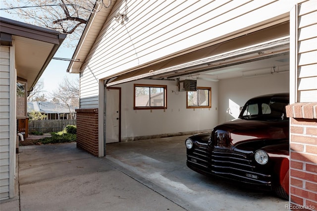 garage featuring fence