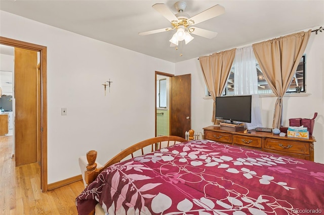 bedroom featuring light hardwood / wood-style floors and ceiling fan