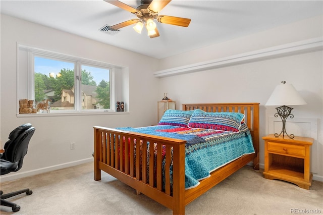 7330 Routt St, Arvada, CO 80005 - carpeted bedroom featuring baseboards and a ceiling fan