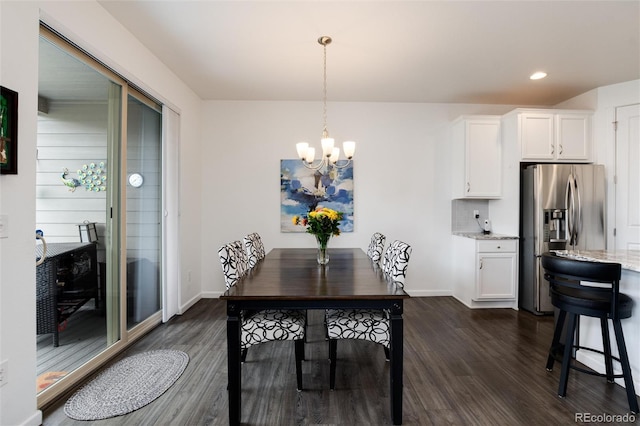11823 Barrentine Loop, Parker, CO 80138 - dining area with a chandelier, dark wood finished floors, and recessed lighting