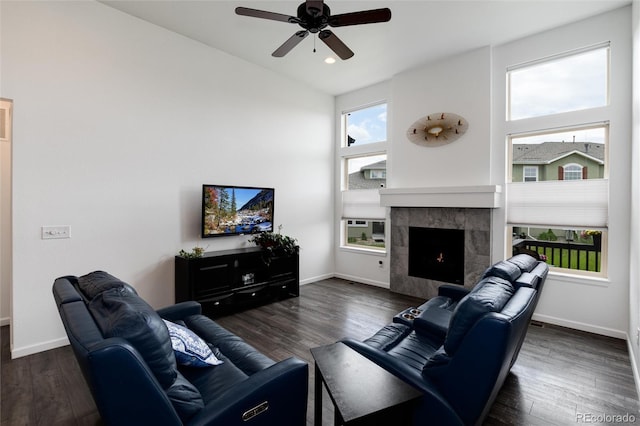 11823 Barrentine Loop, Parker, CO 80138 - living room with ceiling fan, wood finished floors, a tiled fireplace, and recessed lighting