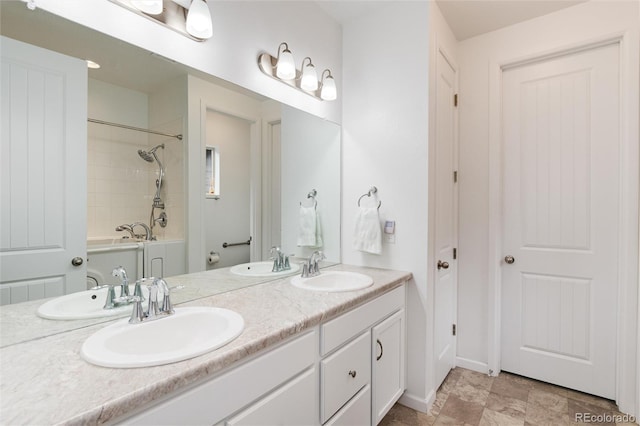 11823 Barrentine Loop, Parker, CO 80138 - bathroom with double vanity and bathtub / shower combination