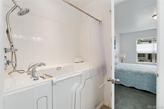 11823 Barrentine Loop, Parker, CO 80138 - ensuite bathroom with shower / bath combination with curtain