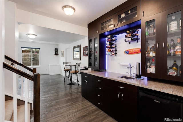 11823 Barrentine Loop, Parker, CO 80138 - indoor wet bar with dishwasher, dark wood-type flooring, and stairway