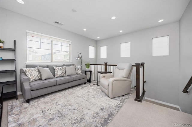 525 Grenville Cir, Erie, CO 80516 - carpeted living area with recessed lighting and baseboards