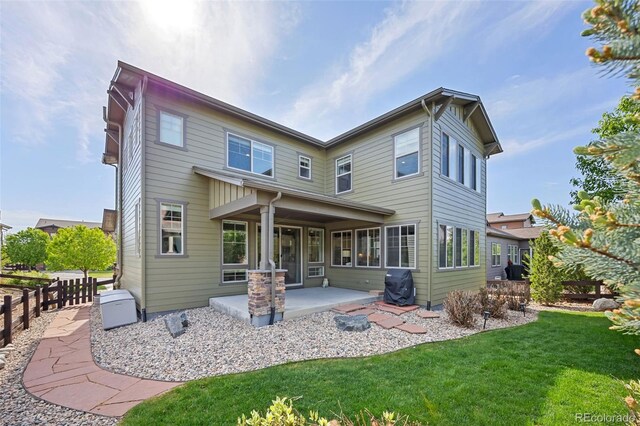 525 Grenville Cir, Erie, CO 80516 - back of house featuring a patio