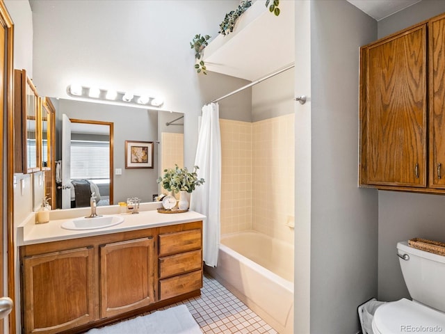 full bathroom featuring shower / bathtub combination with curtain, vanity, toilet, and tile patterned floors