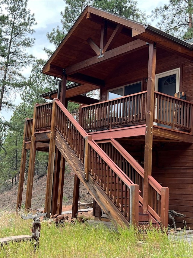 view of home's exterior with stairs