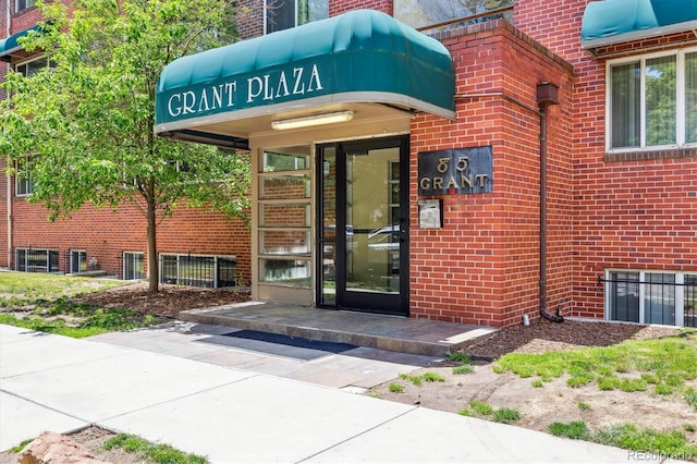 85 N Grant St Unit 28, Denver, CO 80203 - property entrance with brick siding