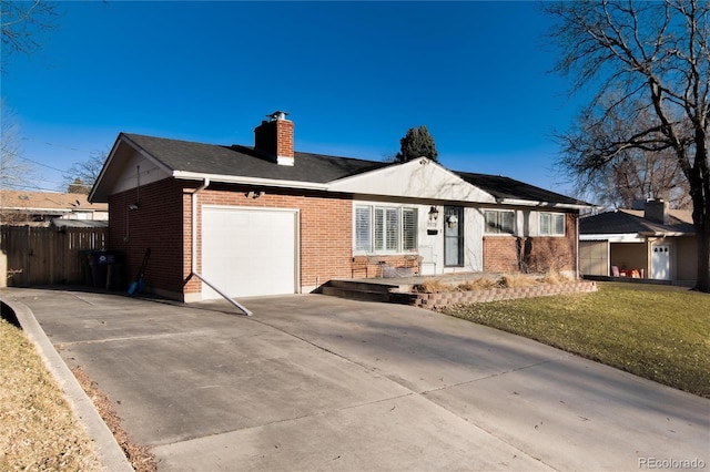 ranch-style house with brick siding, driveway, a chimney, and an attached garage