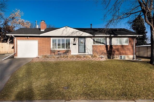 ranch-style house featuring driveway, a garage, a chimney, a front lawn, and brick siding