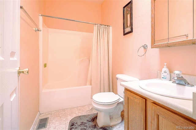 full bathroom with shower / bath combo with shower curtain, tile patterned floors, vanity, and toilet