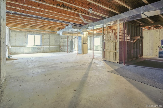 basement featuring gas water heater