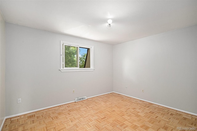 8727 E Girard Ave, Denver, CO 80231 - spare room featuring baseboards