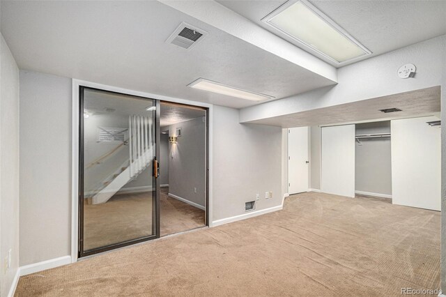 8727 E Girard Ave, Denver, CO 80231 - unfurnished bedroom featuring carpet and baseboards
