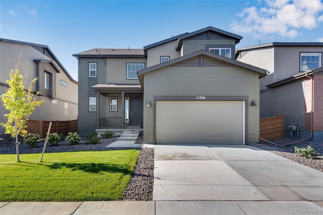 13398 E 99th Pl, Commerce City, CO 80022 - view of front of house featuring driveway and an attached garage