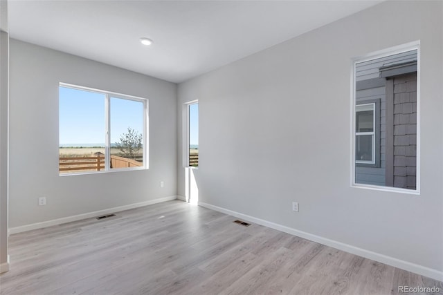 13398 E 99th Pl, Commerce City, CO 80022 - empty room with baseboards, wood finished floors, and recessed lighting