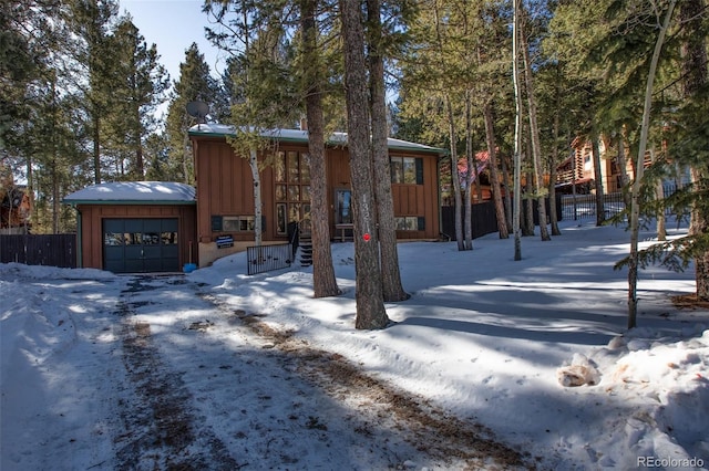 view of front of property with a garage