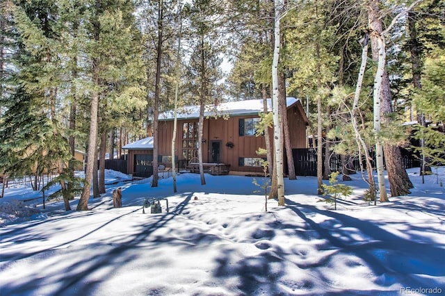 view of snow covered house