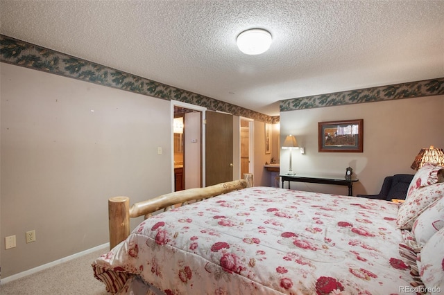 carpeted bedroom featuring a textured ceiling