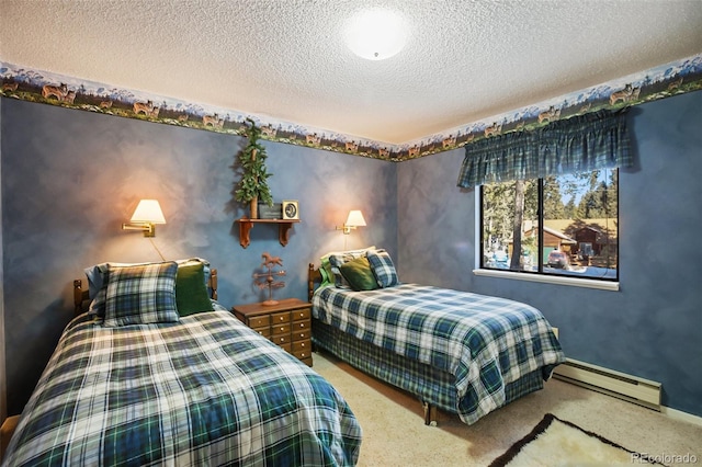 1321 W Midland Ave, Woodland Park, CO 80863 - bedroom featuring baseboard heating, a textured ceiling, and carpet flooring