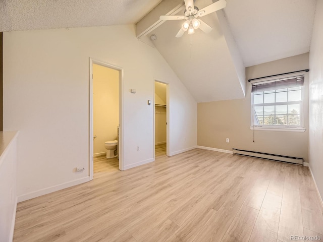 bonus room with light wood-type flooring, a textured ceiling, ceiling fan, lofted ceiling with beams, and a baseboard radiator