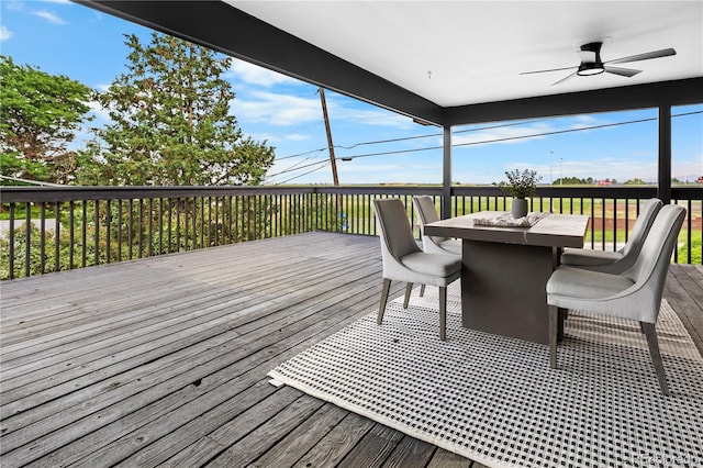 8079 W 67th Ave, Arvada, CO 80004 - wooden terrace featuring a ceiling fan and outdoor dining area