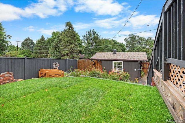 8079 W 67th Ave, Arvada, CO 80004 - fenced backyard featuring an outbuilding