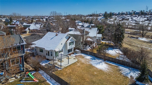 birds eye view of property with a residential view