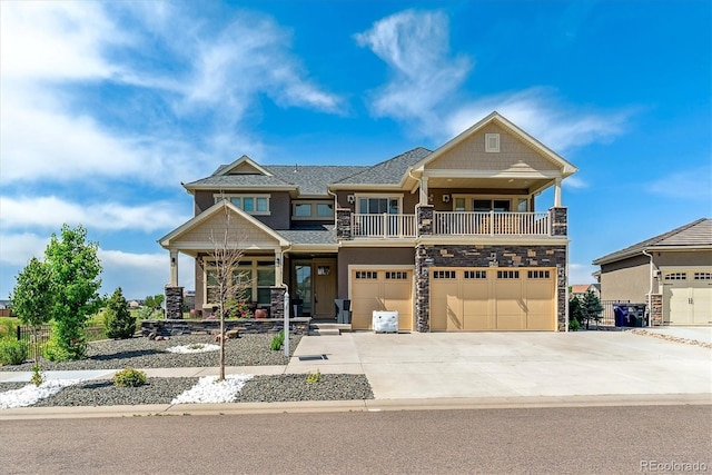 20503 E 50th Pl, Denver, CO 80249 - view of front facade featuring covered porch, stone siding, an attached garage, driveway, and a shingled roof