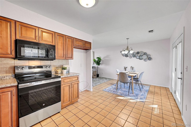 kitchen with backsplash, an inviting chandelier, stainless steel electric range oven, hanging light fixtures, and light tile patterned flooring